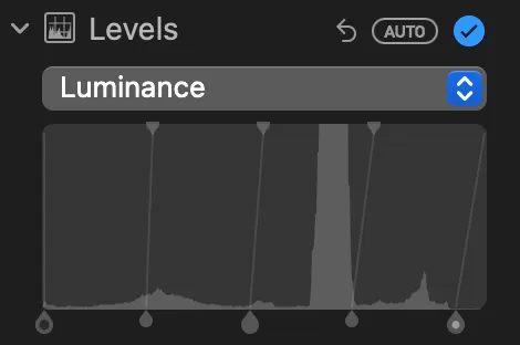 Adjusting levels in Photos